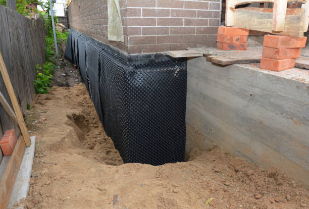 SJ Waterproofing Pros technician performing targeted Waterproofing assessment in Swayzee, IN
